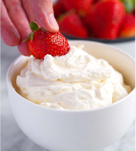 Whipped Cream with Cocoa Calm Coffee Dust and Strawberries