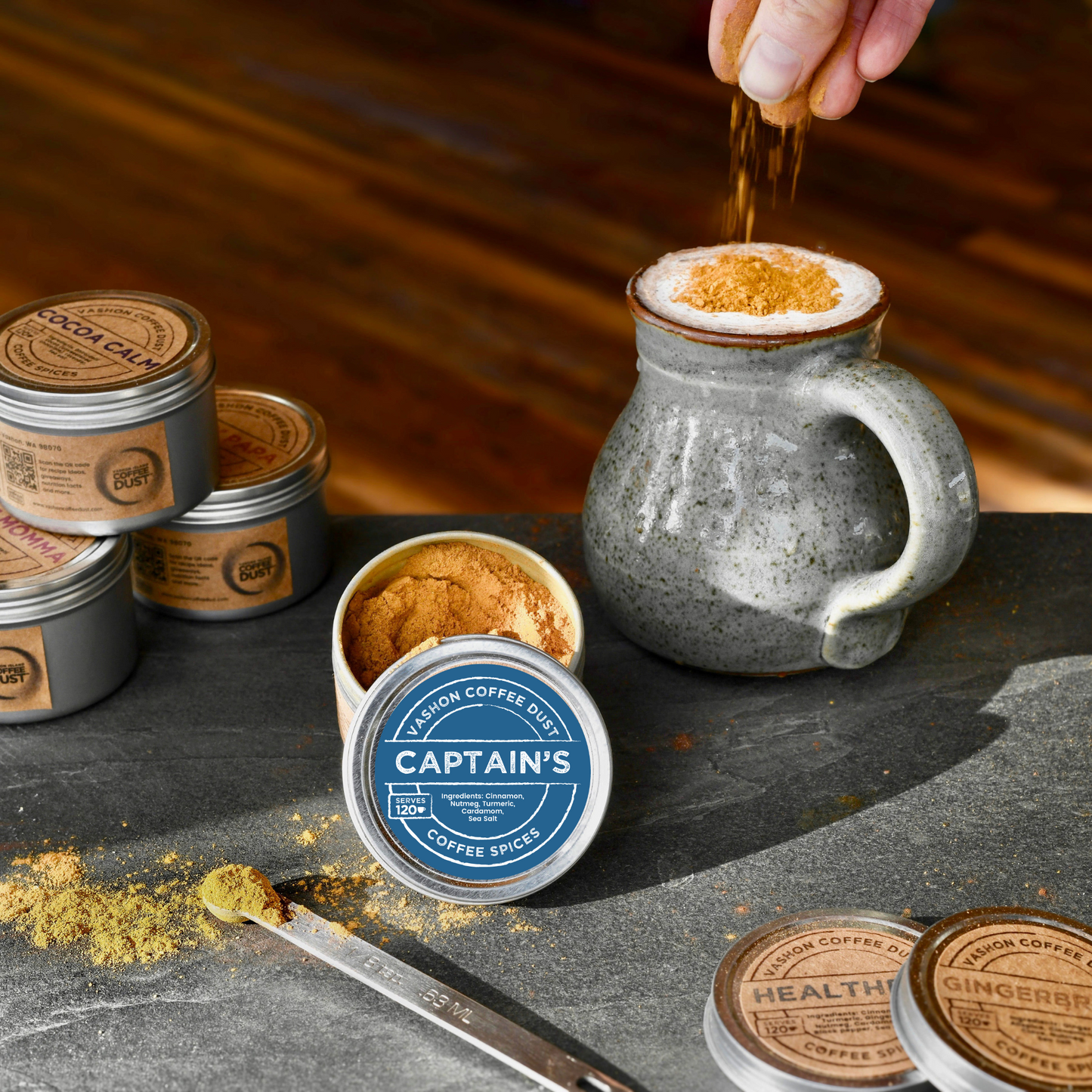 Lifestyle pic of dusting a coffee with Captain's Coffee Dust 